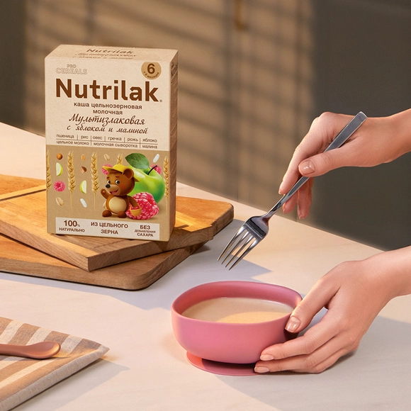 Каша для ребёнка Nutrilak молочная мультизлаковая с яблоком и малиной